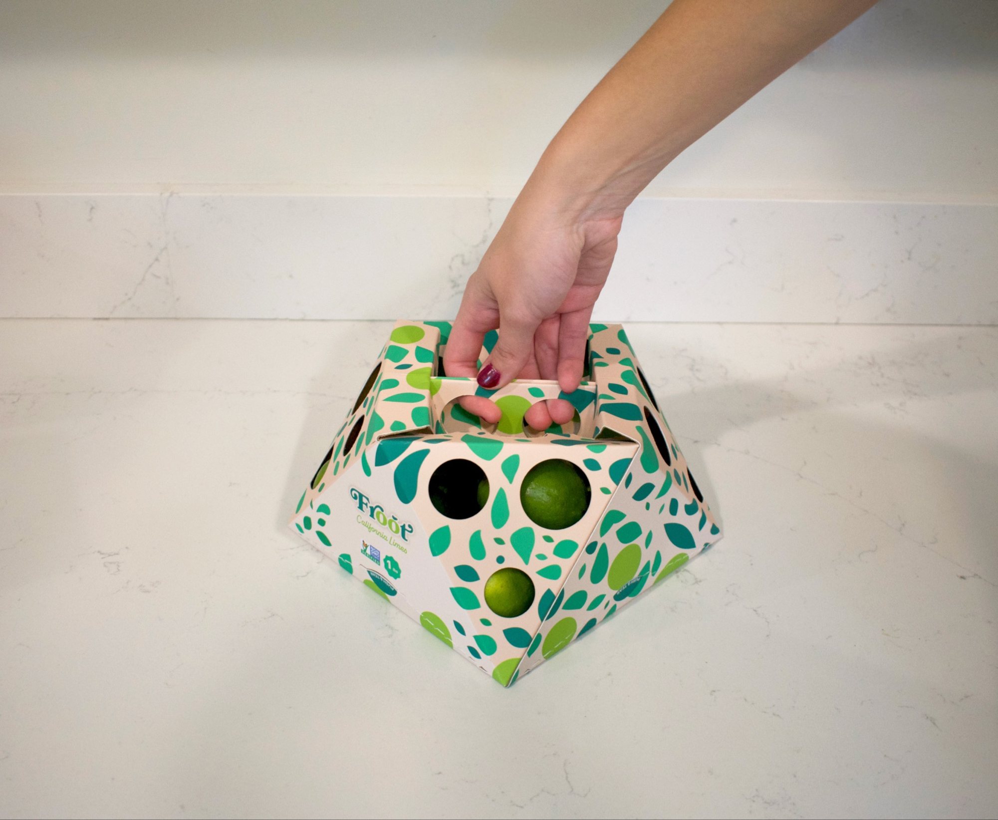 The lime carton carried by its handle